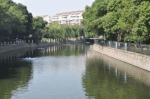 Sewage treatment in a river